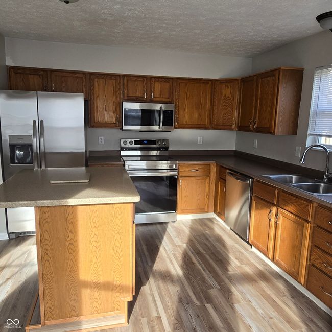 New appliances and cabinets galore... | Image 15