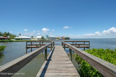 Beautiful wood dock looking out to the Banana River. | Image 3