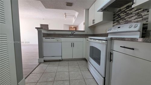 203-5011 Wiles Rd, Coconut Creek, FL, 33073-4203 | Card Image