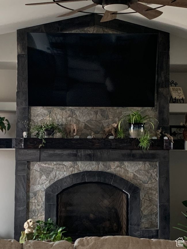 Room details featuring a fireplace | Image 8