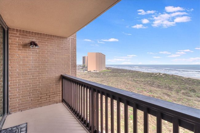 Master balcony view of ocean and way down the island. | Image 16