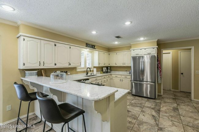 202 S Garland St, House other with 4 bedrooms, 2 bathrooms and null parking in Plainview TX | Image 10