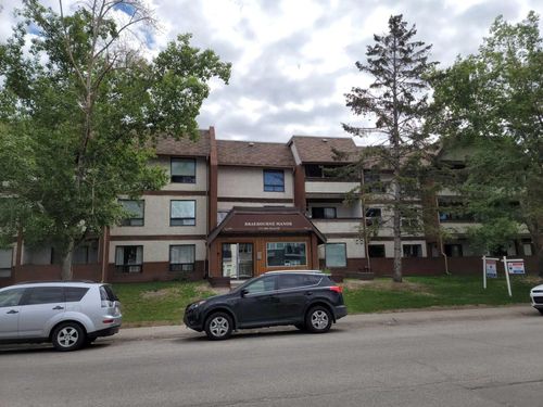 209 - 1712 38 Street Se, Home with 2 bedrooms, 1 bathrooms and 1 parking in Calgary AB | Card Image