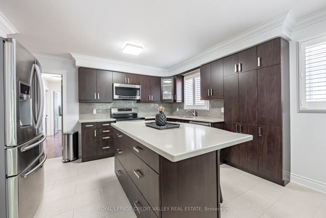 8 Petunias Rd, House attached with 4 bedrooms, 2 bathrooms and 3 parking in Brampton ON | Image 6