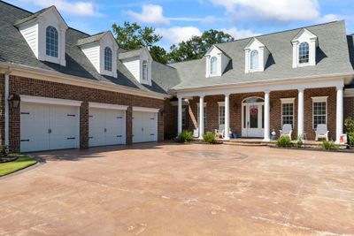 Cape cod house with a garage and covered porch | Image 3