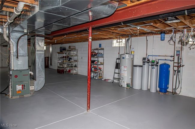 Below grade area featuring gas water heater | Image 20