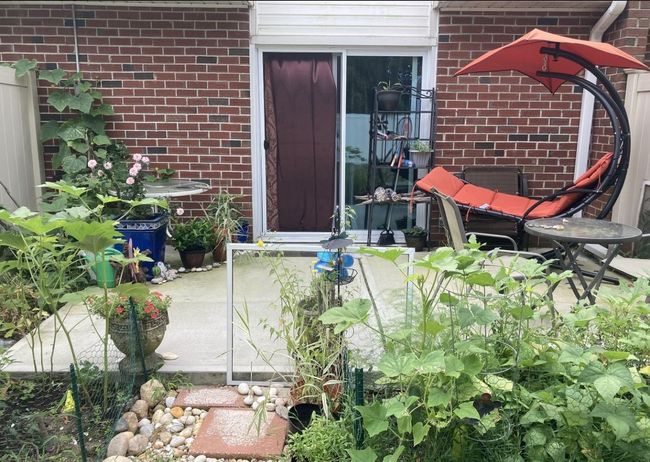 Entrance to property featuring brick siding | Image 15