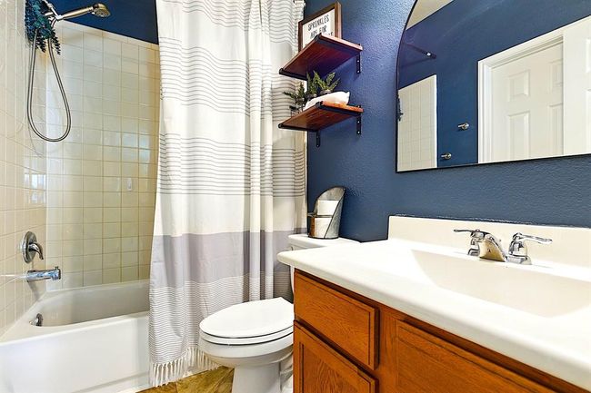!st floor bathroom that connects to the bedroom. | Image 13