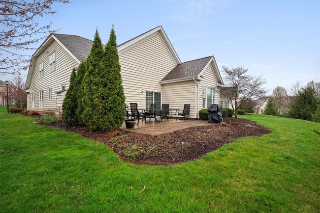 Spend time eating outdoors and grilling on your private back patio during those summer months. | Image 4