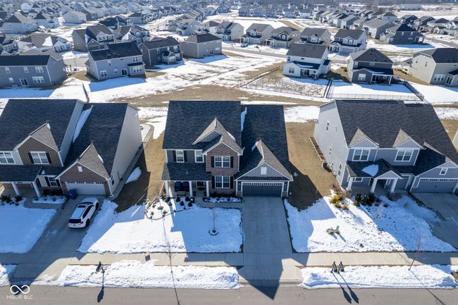 snowy aerial view with a residential view | Image 46