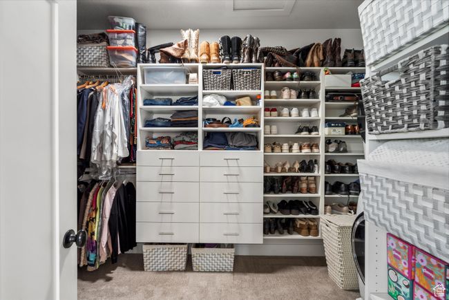 Spacious closet featuring carpet and attic access | Image 30