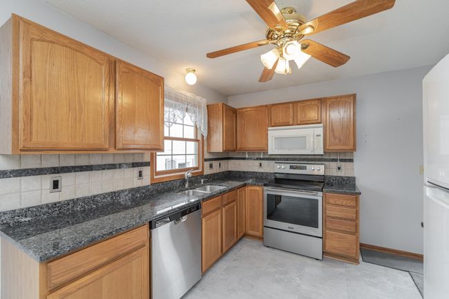 Large kitchen window and kitchen cabinets | Image 10