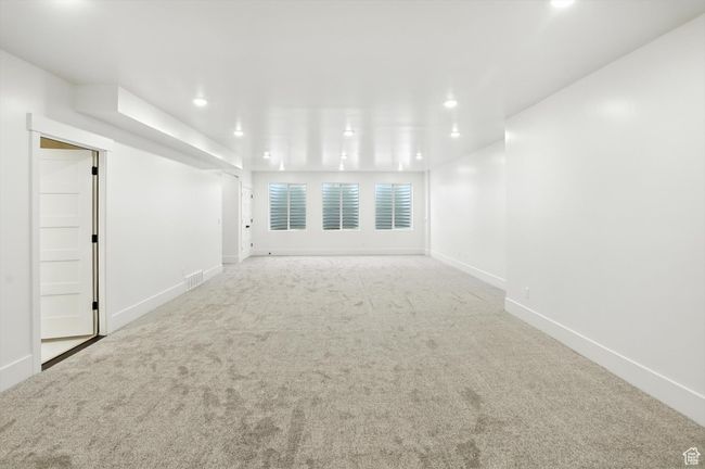 Unfurnished room featuring carpet floors and recessed lighting | Image 41