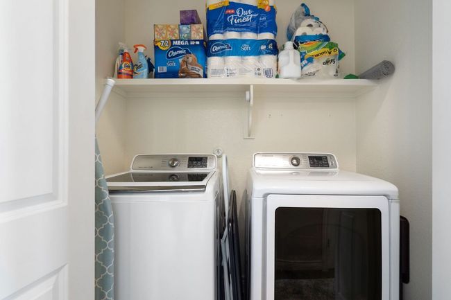 2nd Floor Washroom with laundry area and washer/dryer | Image 25