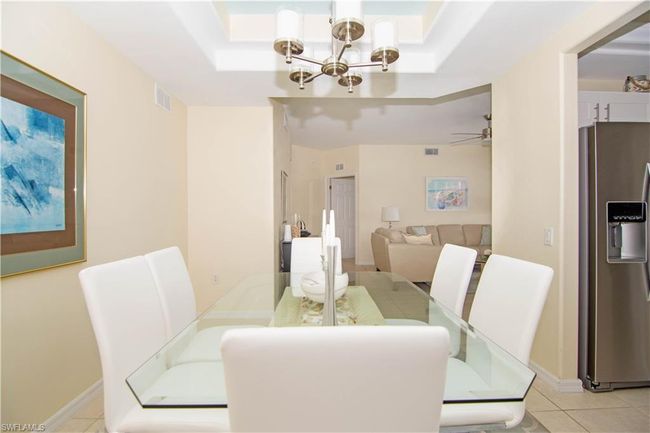 Adjacent to the kitchen- entertain guests in your dining room with ease and style. | Image 9