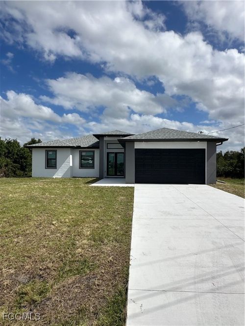 569 Bourse Cir, LEHIGH ACRES, FL, 33974-2619 | Card Image