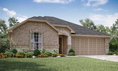 View of front facade featuring a front lawn and a garage | Image 1