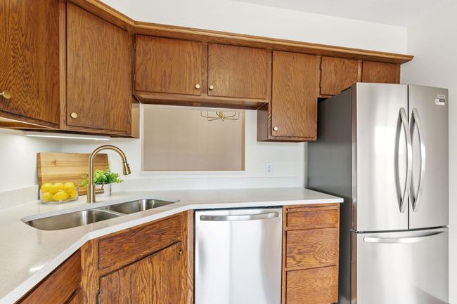 A convenient pass-through window to the dining space. | Image 10
