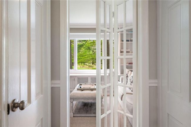 French door leading to den | Image 16