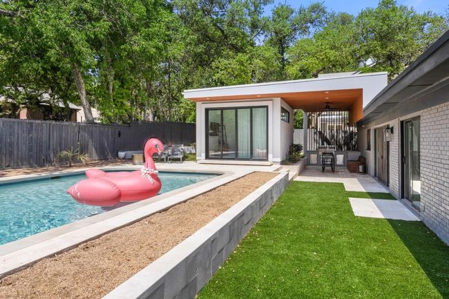 View of pool featuring fence, a fenced in pool, and a patio | Image 32