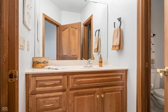 bathroom featuring toilet and vanity | Image 86
