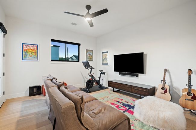 Extra bonus living space can be 2nd study, media room or game room with access to the exterior stairs leading to the rooftop patio | Image 24