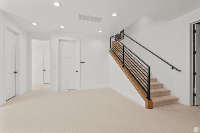 Staircase featuring recessed lighting and carpet | Image 50