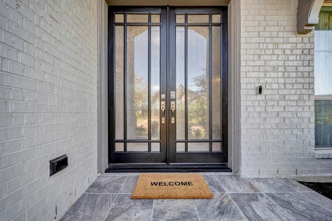 Welcome your guests through these stately double doors. | Image 6