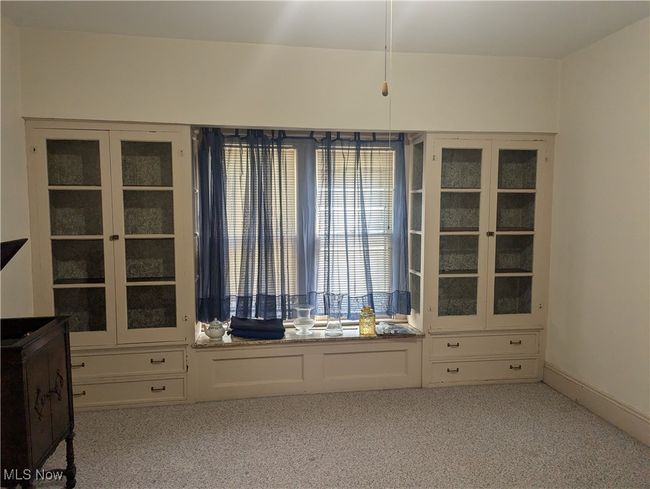 First-Floor Dining Room with light colored carpet | Image 8