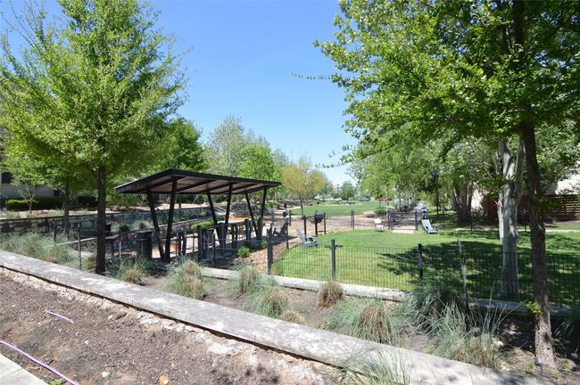 View of community grilling and outdoor game area | Image 31