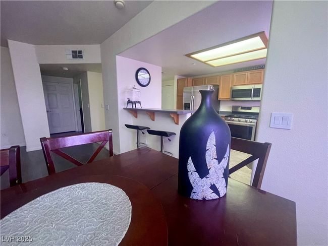 Dining area featuring visible vents | Image 19