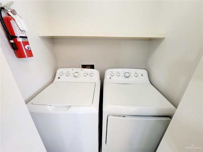 Laundry room featuring washer and dryer | Image 9