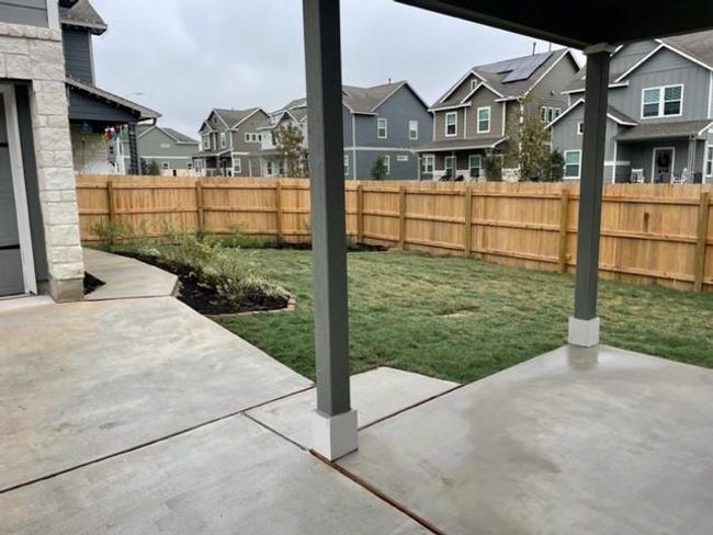 View of yard featuring a residential view and a patio | Image 5