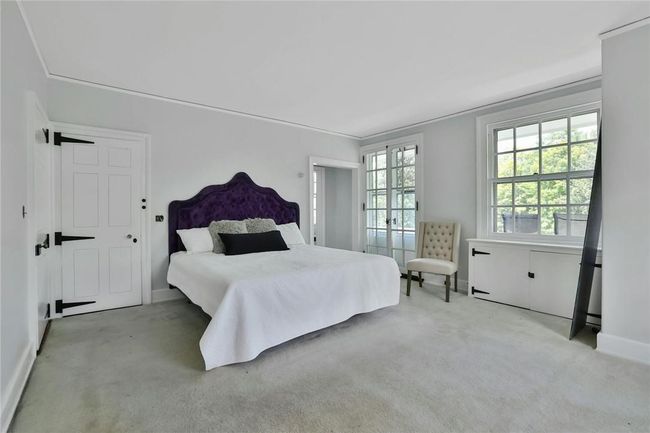 Crown moldings, access to a private balcony and two walk-in closets | Image 20