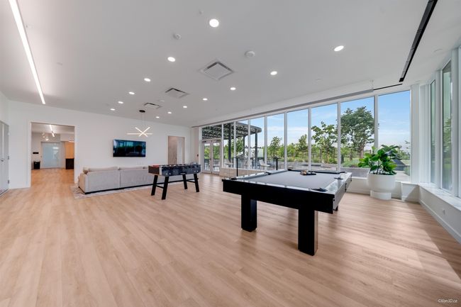 Rec room with billiards table, light wood-style flooring, recessed lighting, and baseboards | Image 17