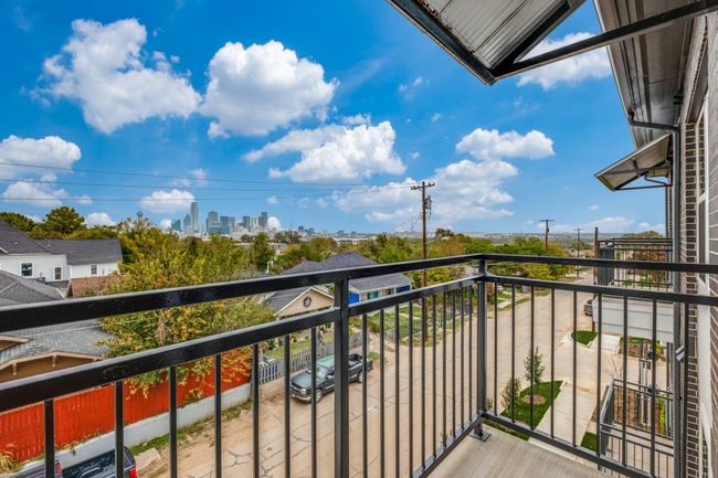 Balcony featuring a city view | Image 17