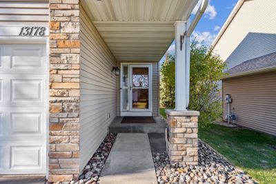 Welcoming front porch with well maintained landscaping | Image 2