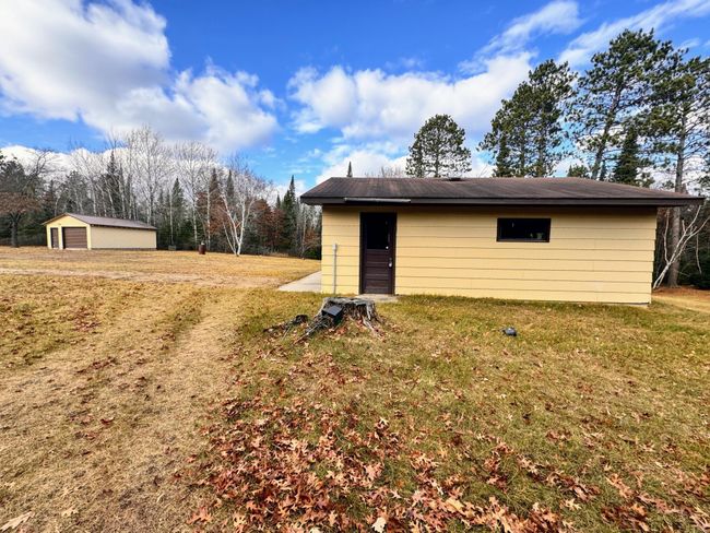 Side view of the double garage and looking toward the shed | Image 4