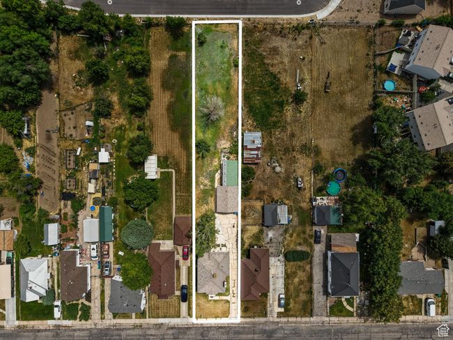 View of property location with property parcel outlined and nearby suburban area | Image 27