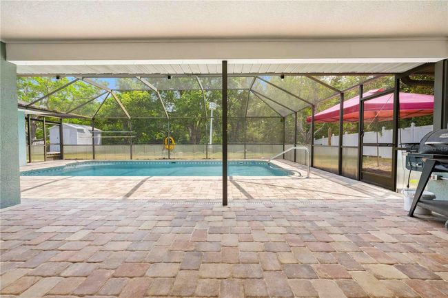 7660 Holiday Dr, House other with 4 bedrooms, 3 bathrooms and null parking in Spring Hill FL | Image 13