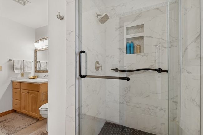 Bathroom featuring recently updated tiled shower | Image 50
