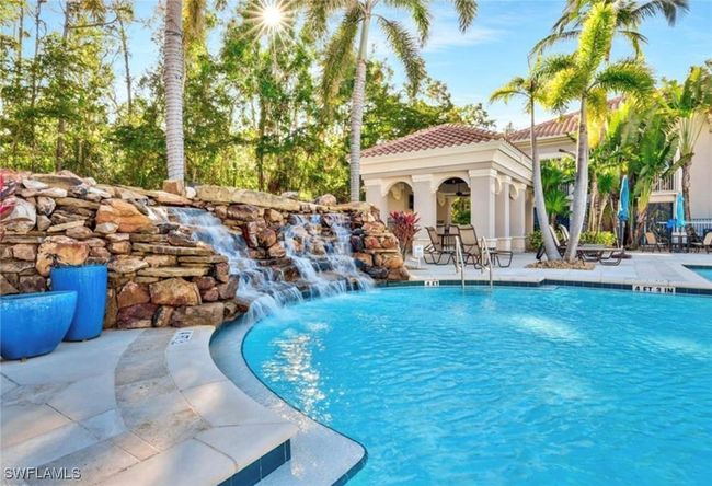 Pool featuring an outbuilding and a patio | Image 4