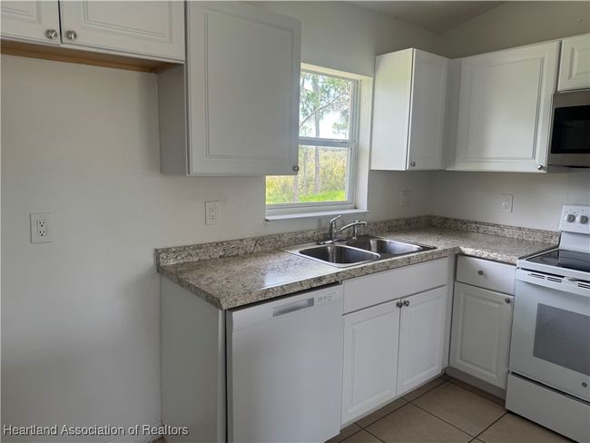 1411 Bittersweet St, House other with 3 bedrooms, 2 bathrooms and null parking in LAKE PLACID FL | Image 7