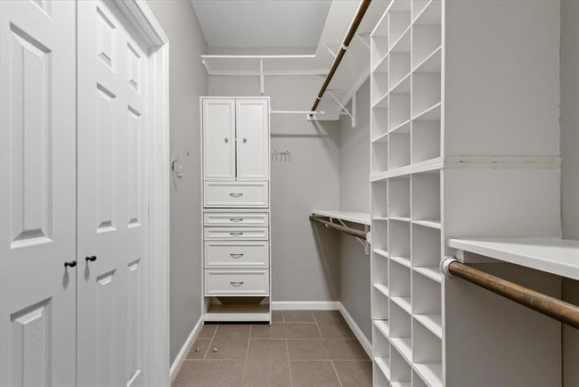 Primary closet was designed to allow your clothing imagination to be illuminated! | Image 20