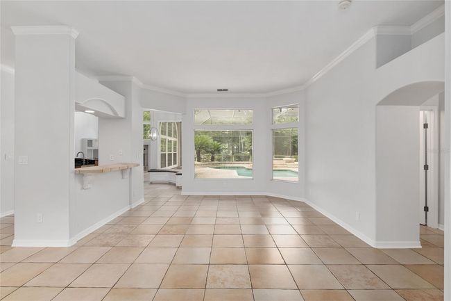 FORMAL LIVING ROOM WITH BAR AREA TO THE LEFT | Image 11