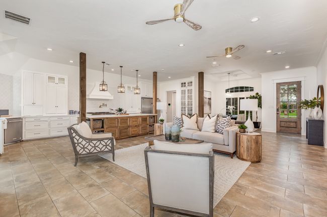 Living area featuring ceiling fan and recessed lighting | Image 5