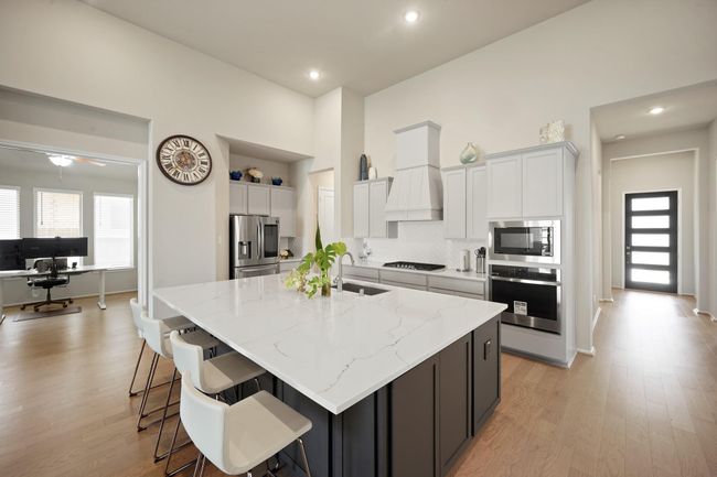 Step into this modern kitchen, wherefunctionality meets sophistication. Notice the large countertop! Just wow | Image 5