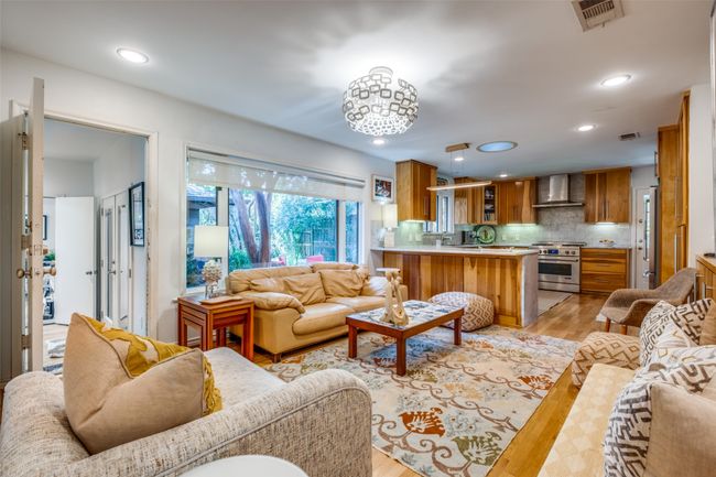 Living room featuring light hardwood / wood-style flooring | Image 7