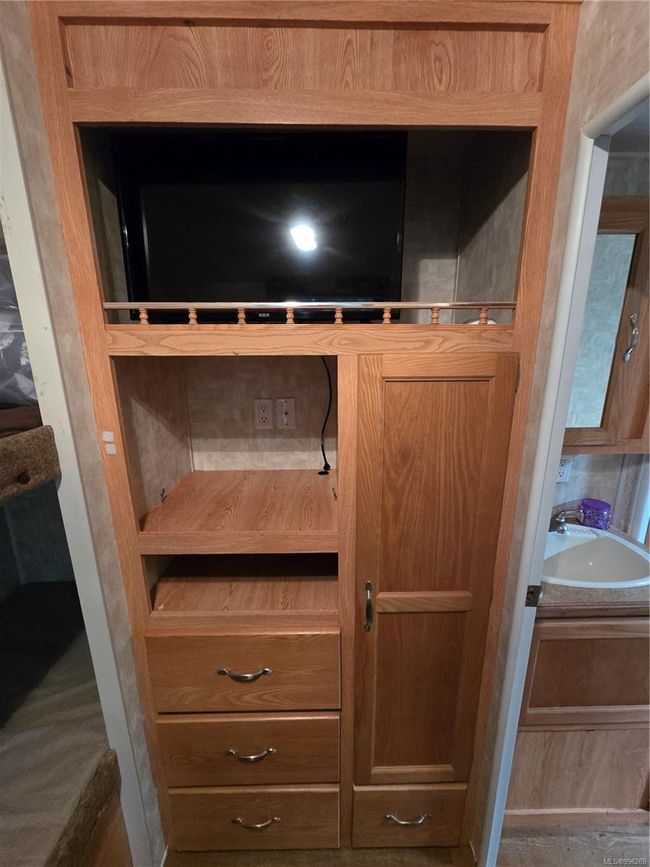 TV & storage in 'kids' room | Image 40