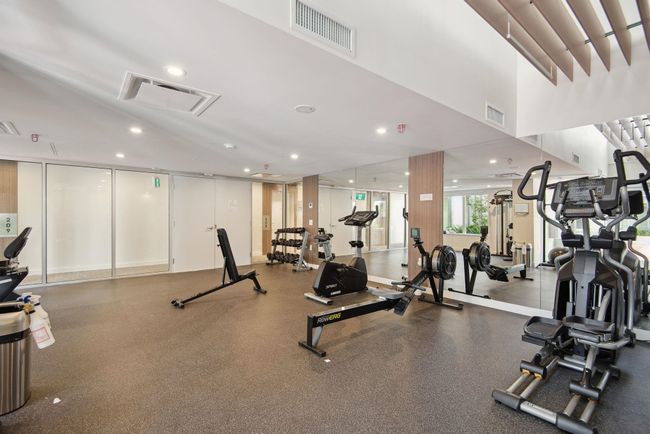 Workout area with recessed lighting and visible vents | Image 24